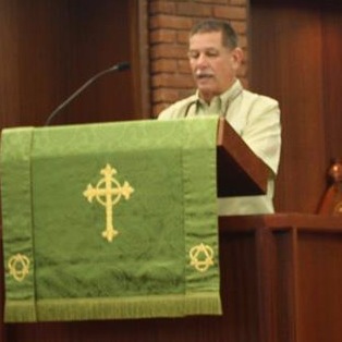 Lector at podium | Calvary Episcopal Church