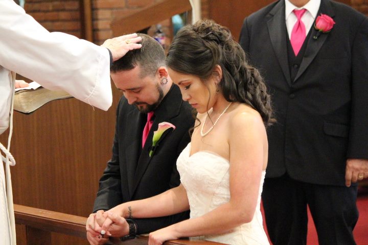 Man and woman getting married at Calvary Episcopal Church